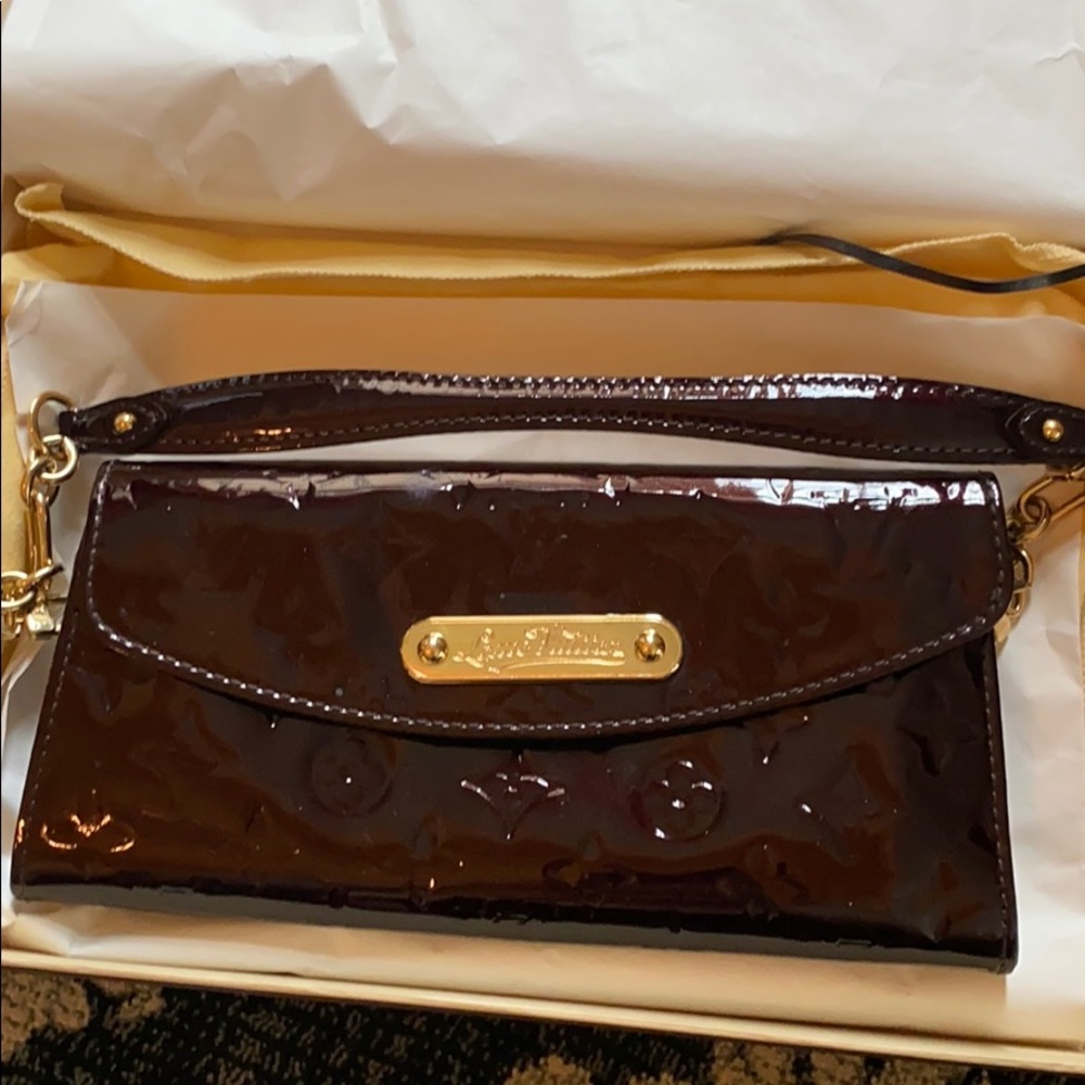 Louis Vuitton burgundy color purse